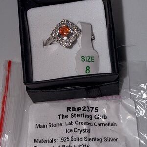 Sterling Silver Ring with Orange Center Stone